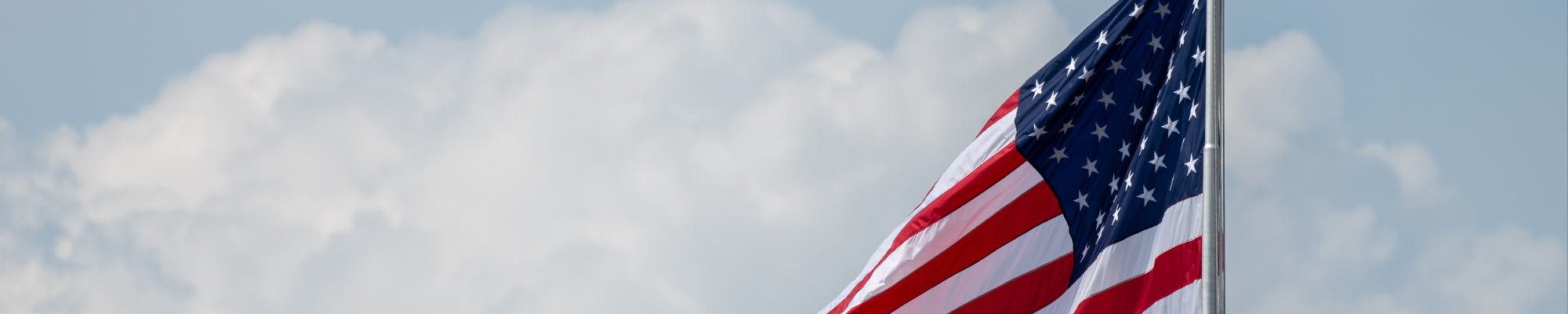 American Flag against blue sky